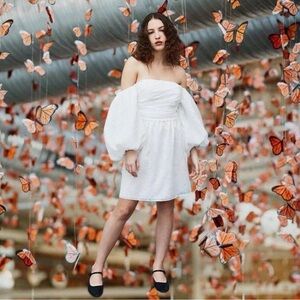 White off-the-shoulder puff sleeve mini dress